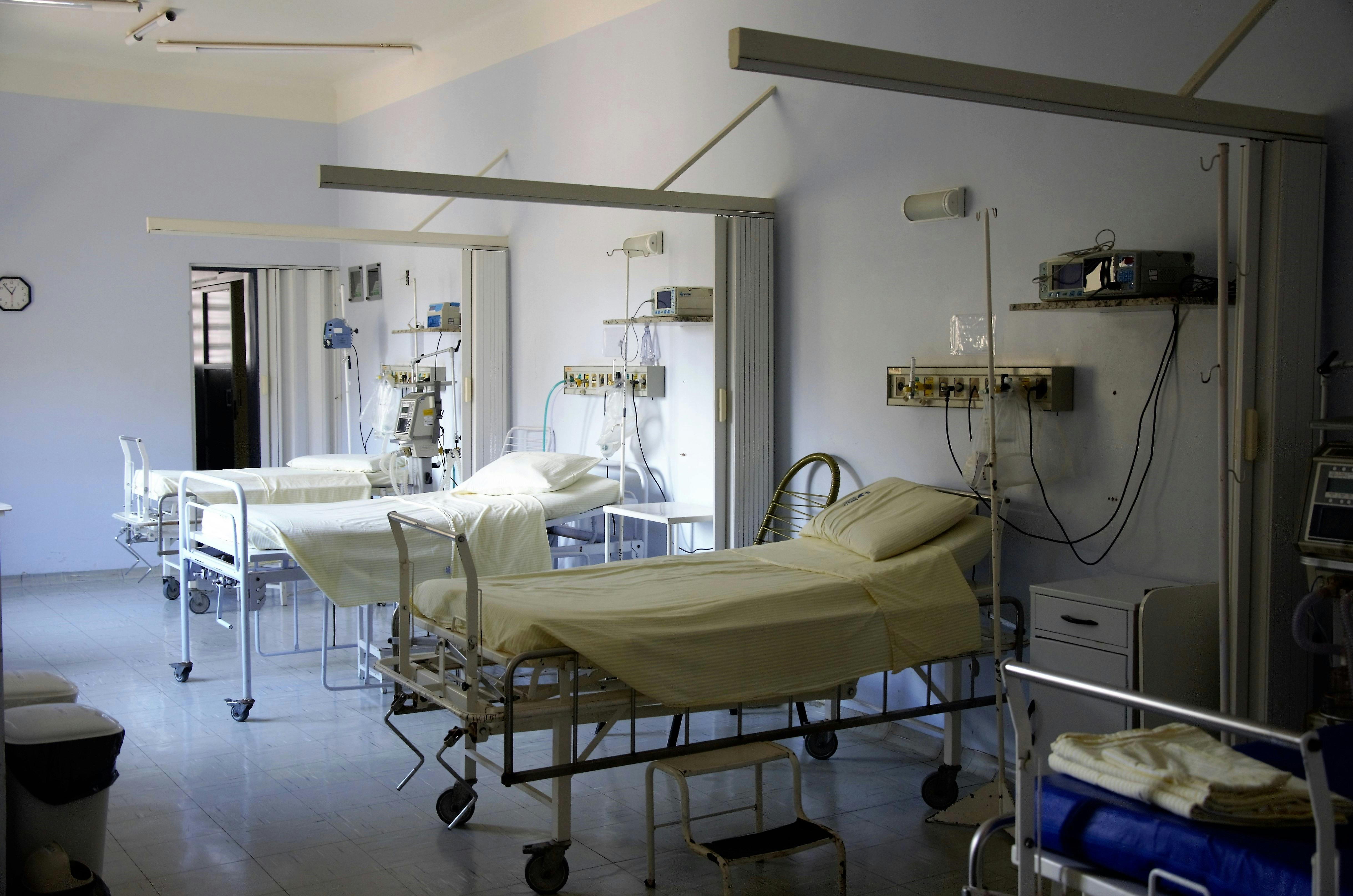 three hospital beds