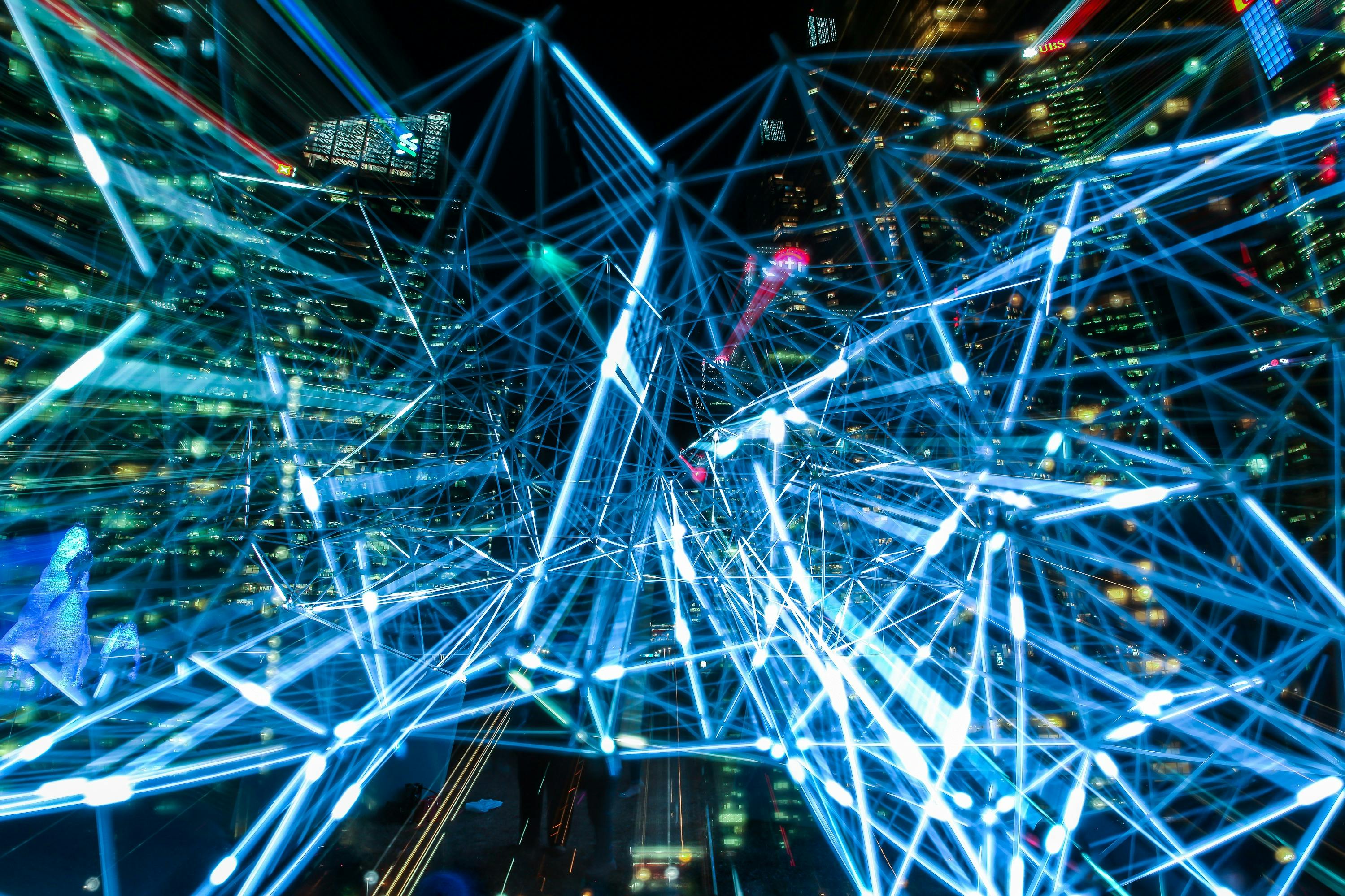 network of blue lights over a city