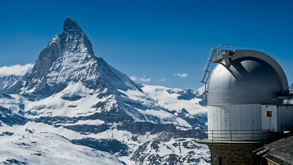 observatory in snowy mountain landscape