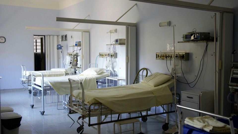 three hospital beds