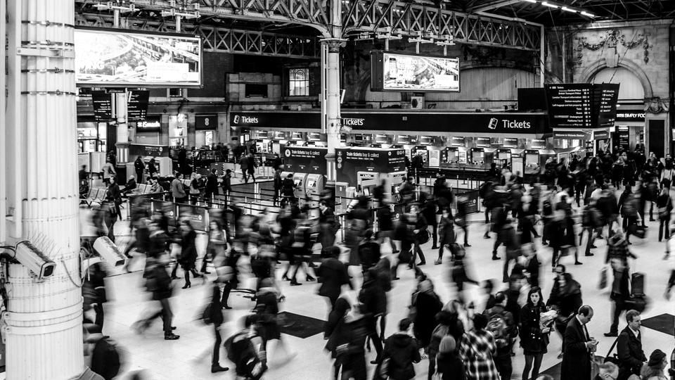 Black and white train station congestion