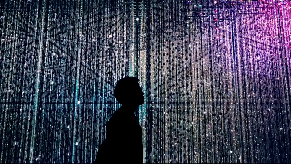 Silhouette of person standing in a digital room