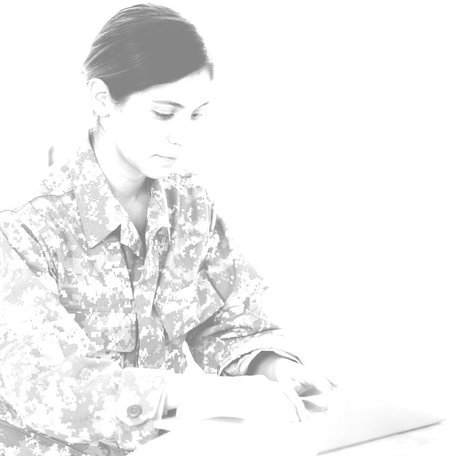 Woman in uniform working at her computer